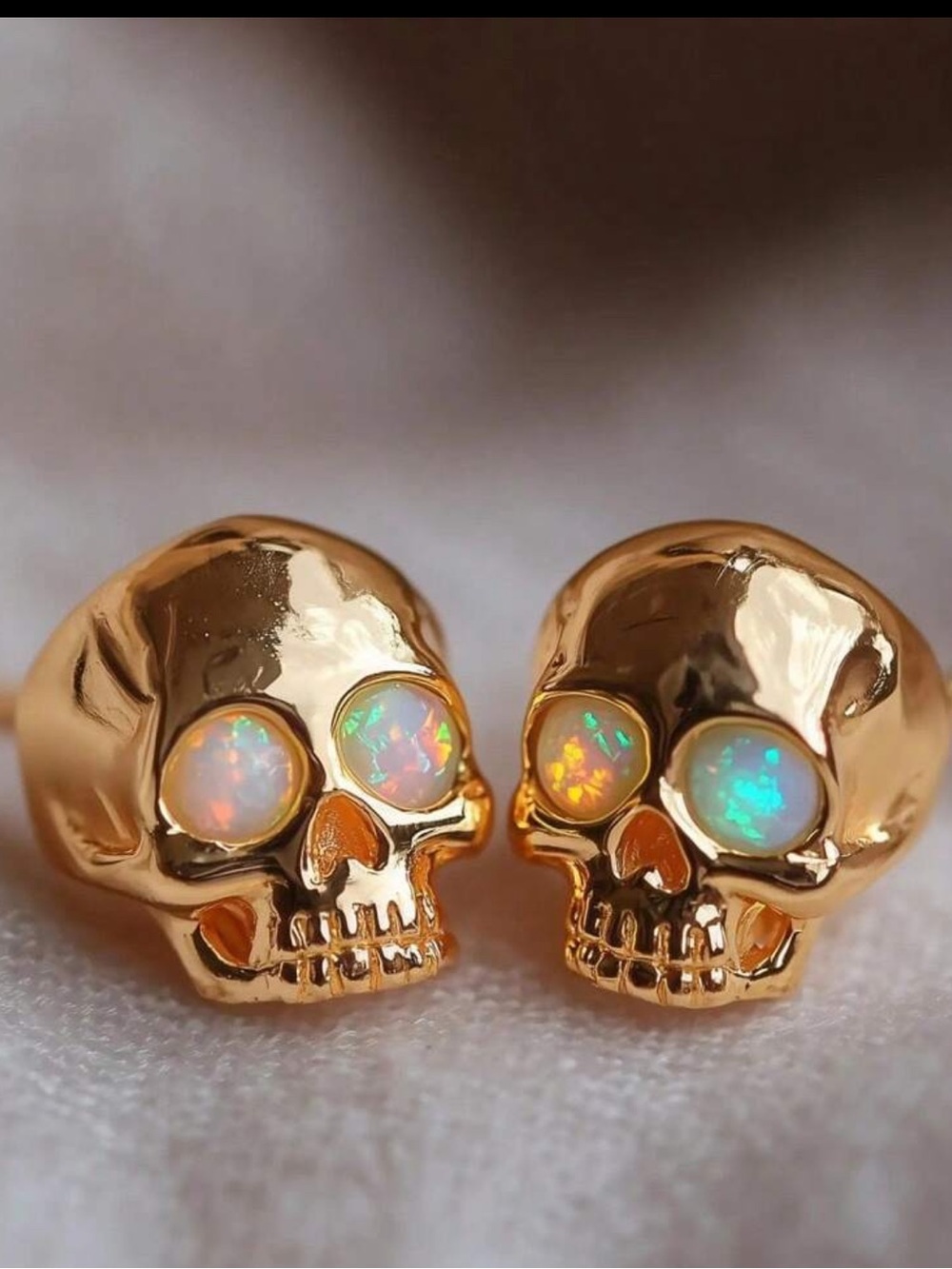 Gold Tone Skull Stud Earrings with Opal / iridescent Eyes